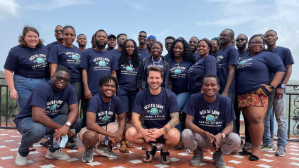 An image of a diverse group of people wearing matching shirts for "Oze". Oze Oze enables banks to lend to small businesses digitally, and is a winner of the Milken Motsepe Prize program.
