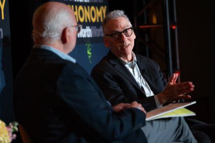 Dan Carol, Senior Director of Finance at the Milken Institute, speaks onstage with Jim McCann at Techonomy Climate West, discussing trends in green finance.