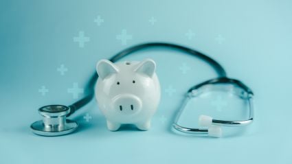A piggybank and a stethoscope