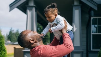 Abstract 3D render of glossy translucent panels arranged in a wave, transitioning from purple to orange.
