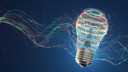 Light bulb with colorful flowing data streams against dark blue background