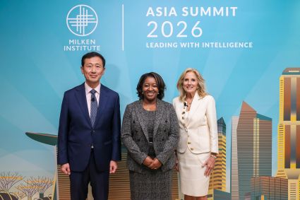 Three business professionals standing together at Asia Summit 2026