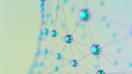 Microscopic view of blue-stained cells connected in a network pattern on pale background