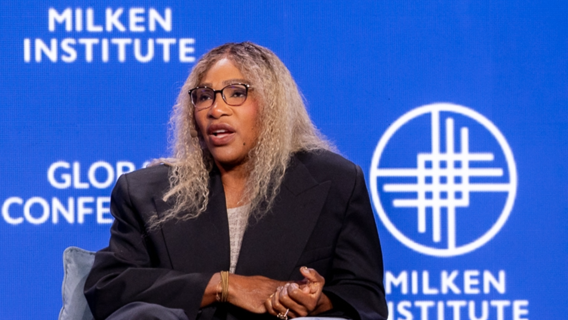 Serena Williams speaking at Milken Institute Global Conference podium