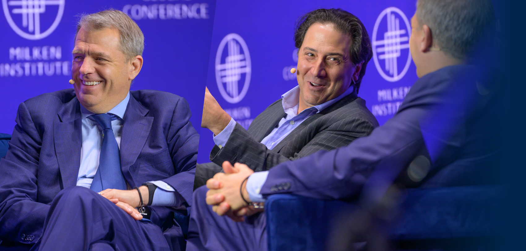 Todd Boehly and Michael Arougheti engaged in conversation at a panel discussion with purple lighting
