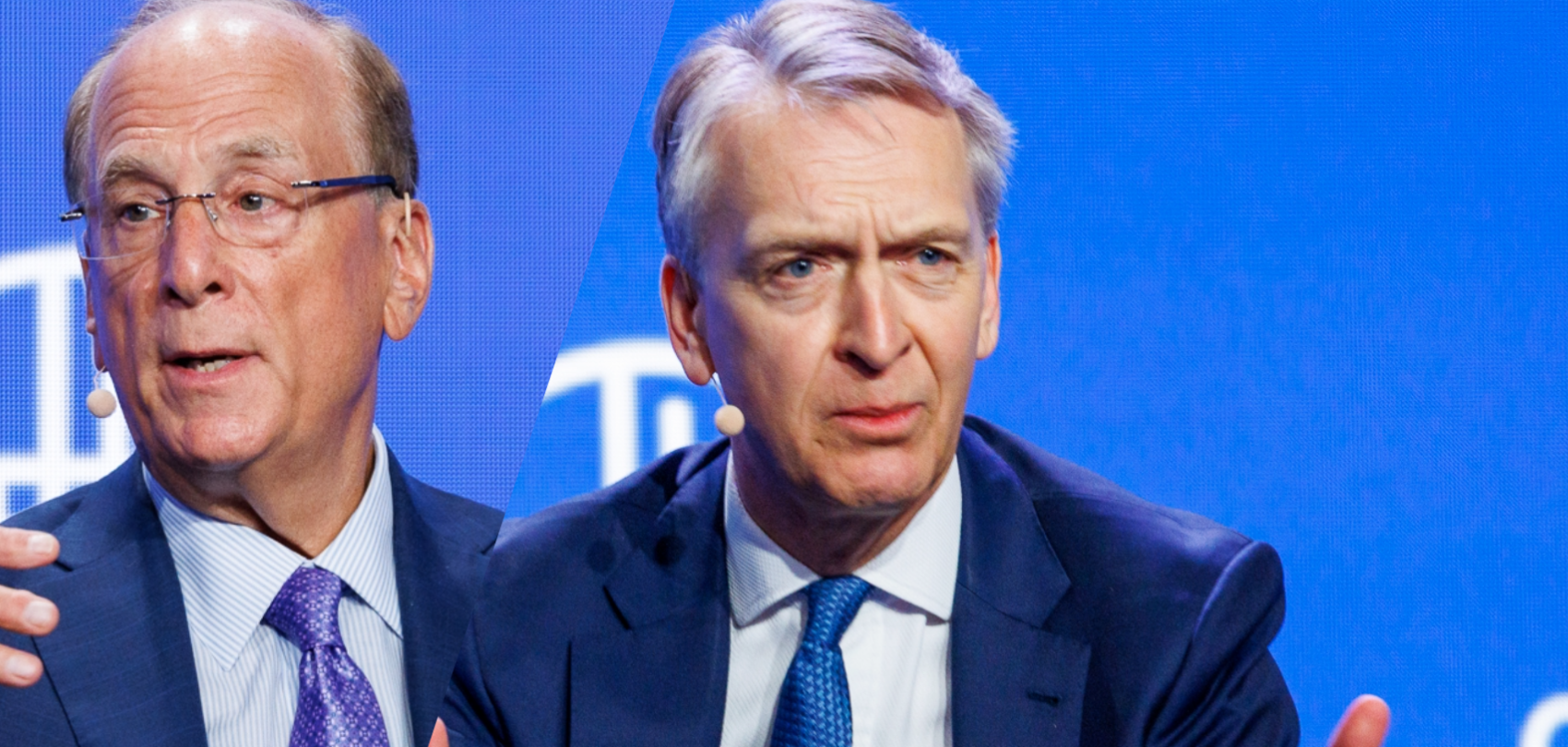 Two men in business suits speaking at a podium against a blue background