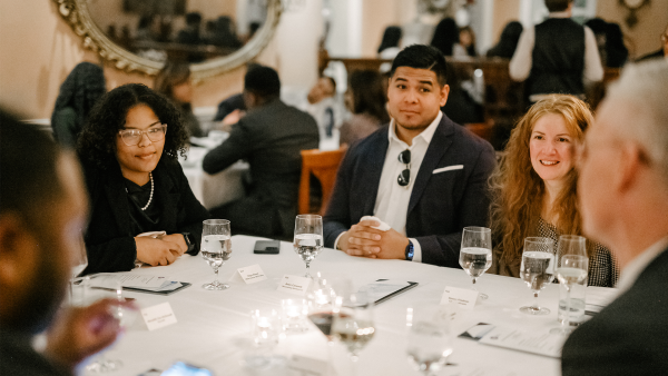 An image of HBCU 2025 Cohort Class at dinner. The Milken Institute's Inclusive Capitalism Program Insights' Team Hosts 2025 HBCU Fellows in Washington, DC. A diverse group of people sitting around an elegant dinner table.
