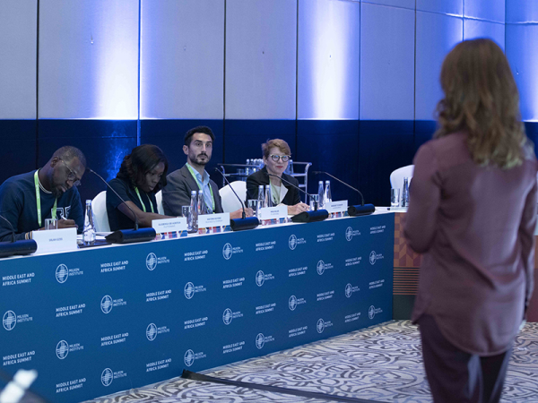people speaking on a panel