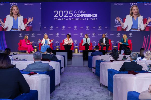 Melissa Stevens moderates a panel of speakers on Corporate Philanthropy at the 2025 Global Conference.