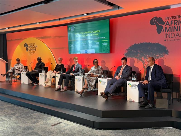 A wide shot of a panel discussion at the African Mining Indaba.