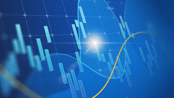 A glowing blue financial chart display showing bar graphs and curved trend lines, with a price label of 129.93 visible.