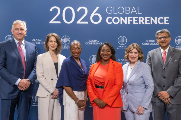 Group of diverse professionals posing at 2026 Global Conference event