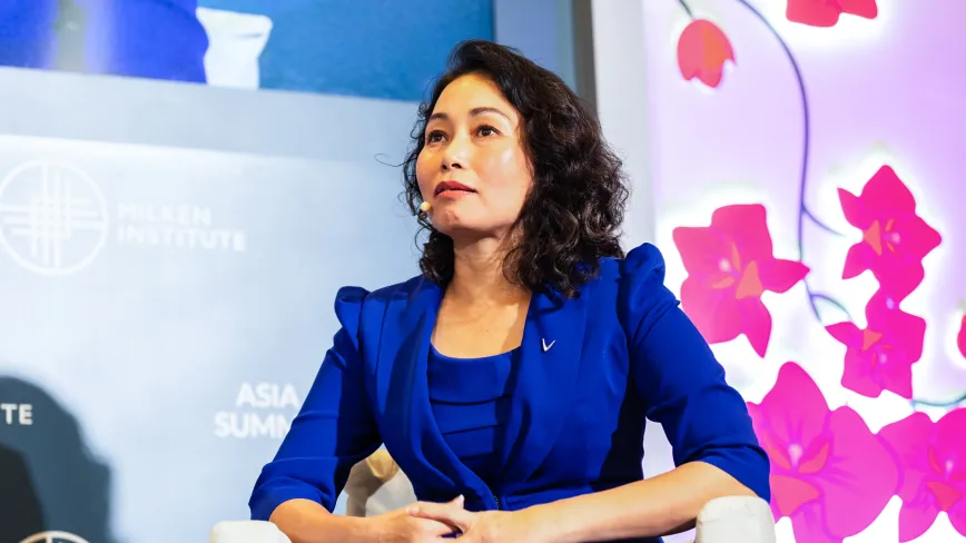 woman speaking on a panel