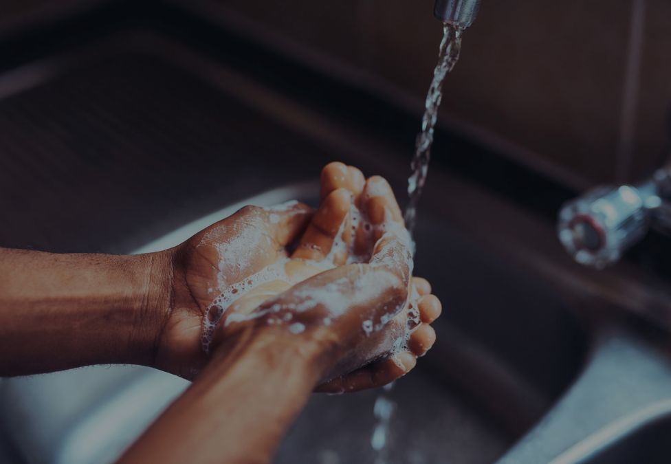 closeup of hands of person washing their hands