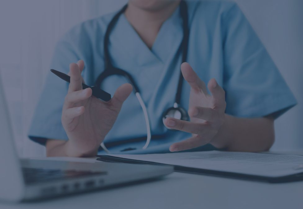 A doctor gesticulating with their hands