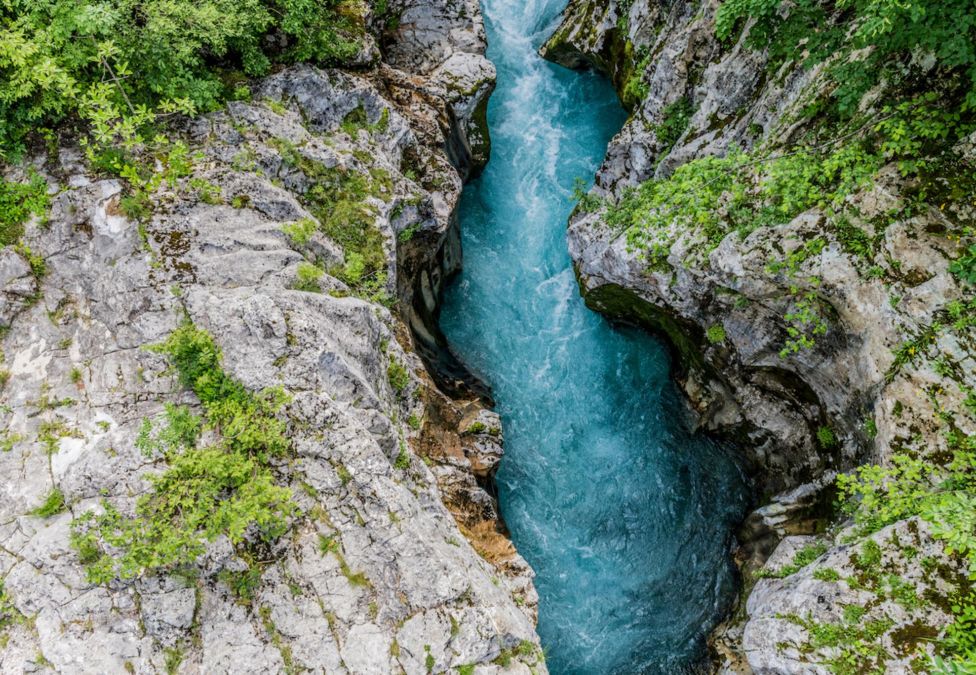 A river running through a rock crevice