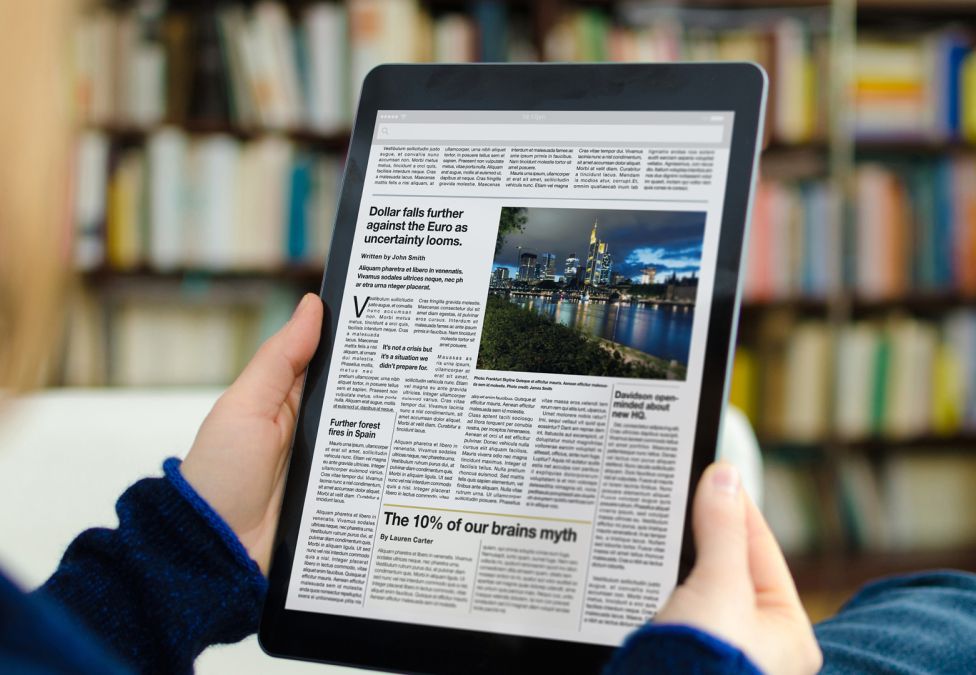Newspaper article on a tablet