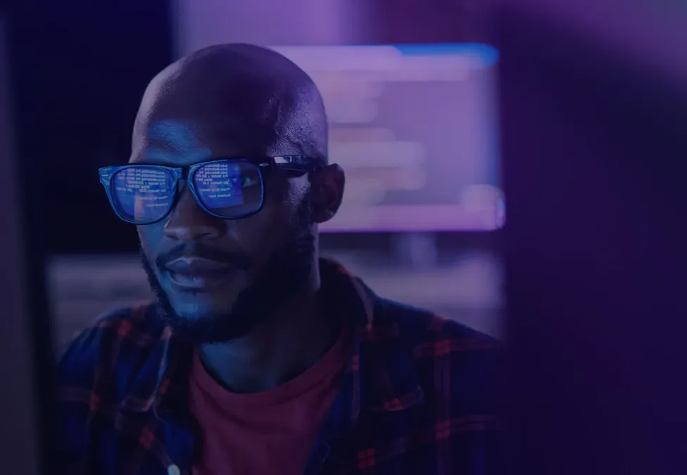 man looking at computer screen