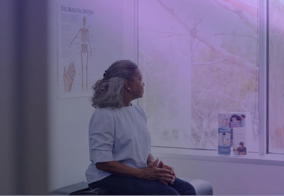 A woman waits in a doctor's office