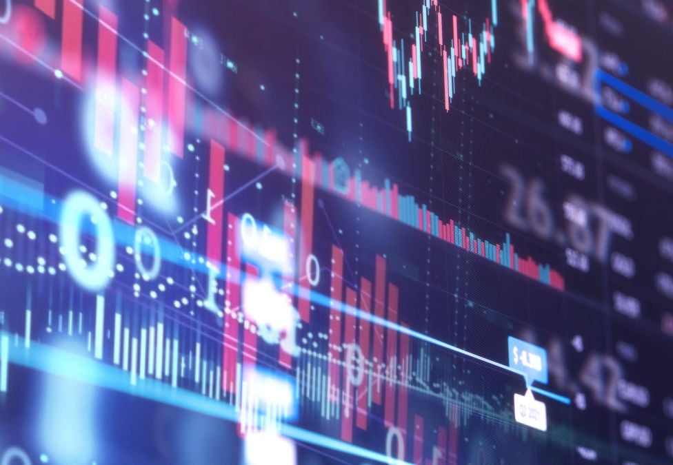 An abstract image of a screen with graphs and technology and numbers.