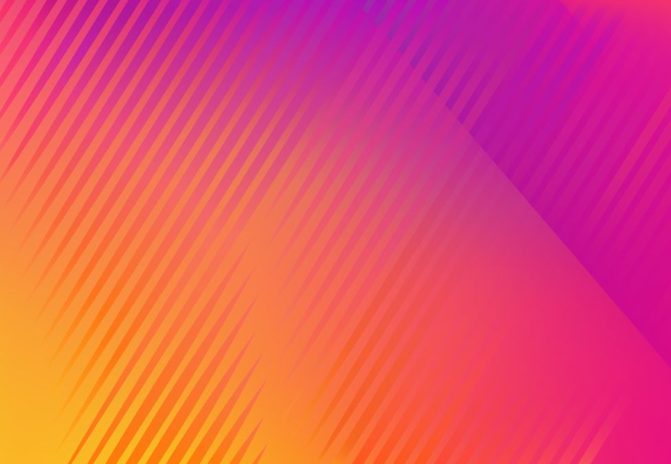 An abstract graphic of a pink to orange ombre coloring accompanied by various faint lines across the image.