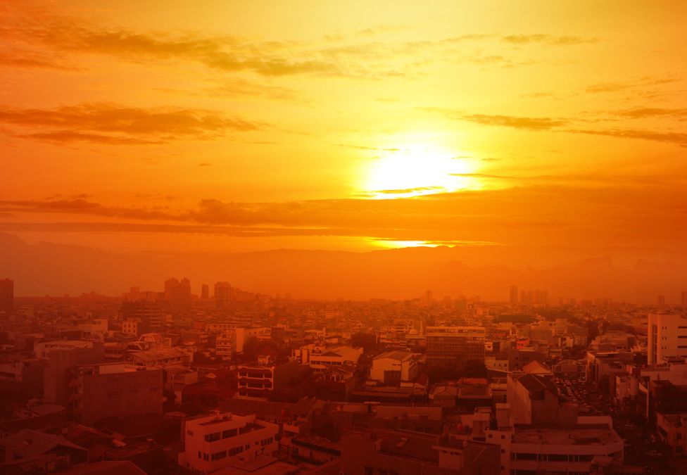 Sun setting over town.