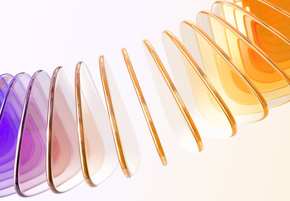 Abstract 3D render of glossy translucent panels arranged in a wave, transitioning from purple to orange.